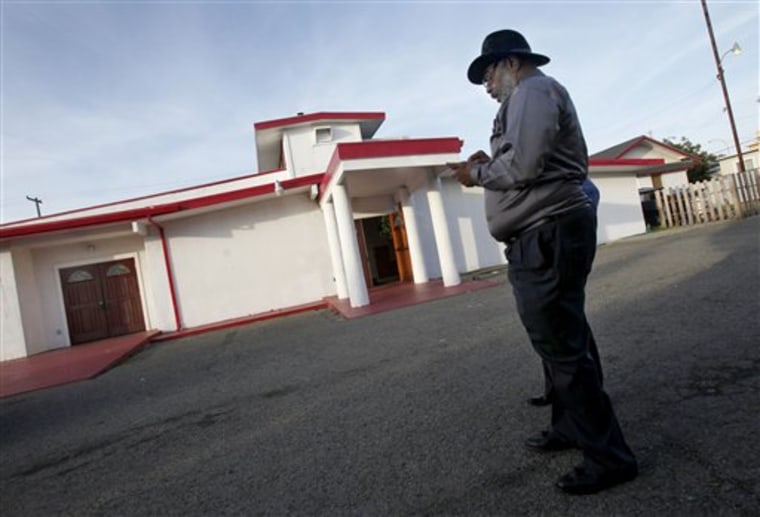 Charles Miller, a deacon, is seen outside the New Gethsemane Church in Richmond, Calif., on Sunday.